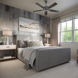 a bedroom with a bed and two nightstands