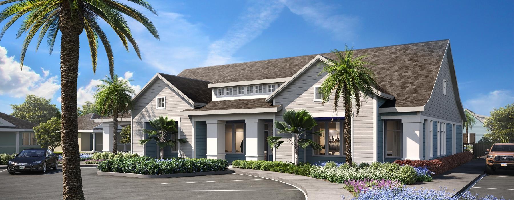 a large house with palm trees