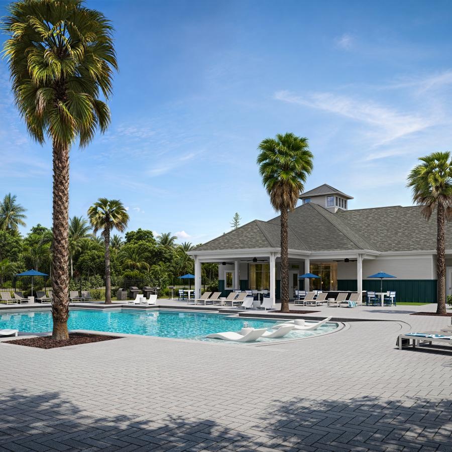 a swimming pool in front of a house