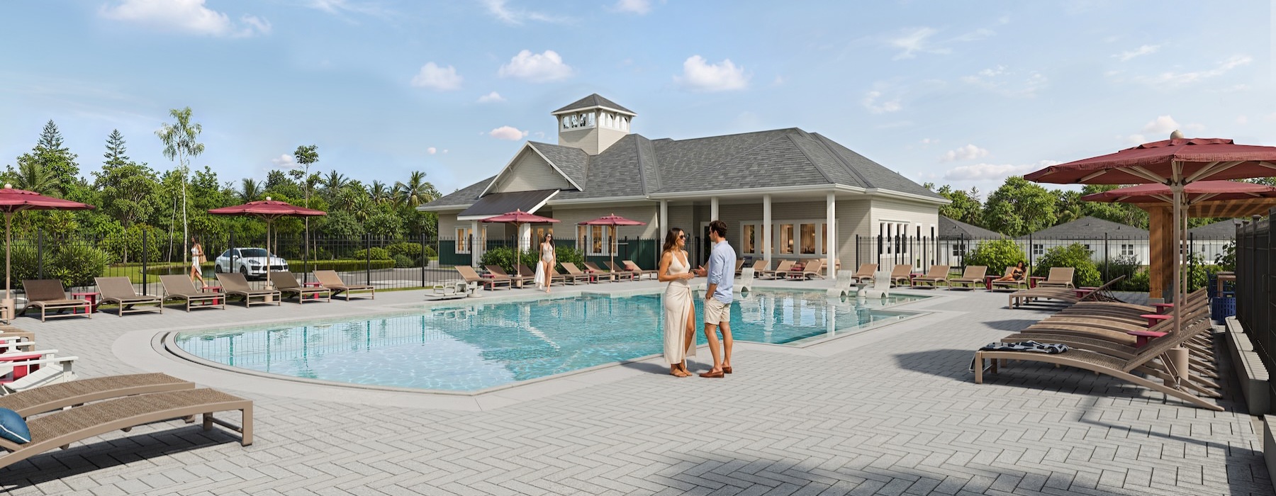 a couple standing by a pool