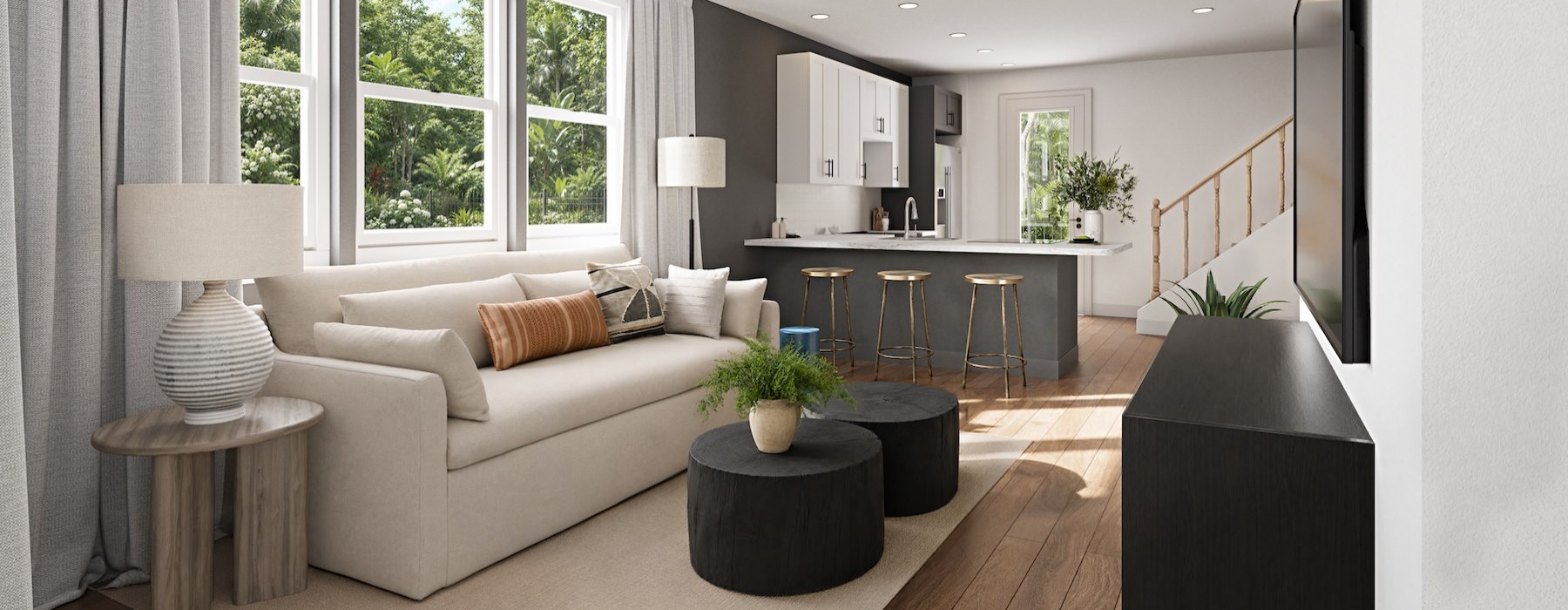 a living room with a white couch and a table