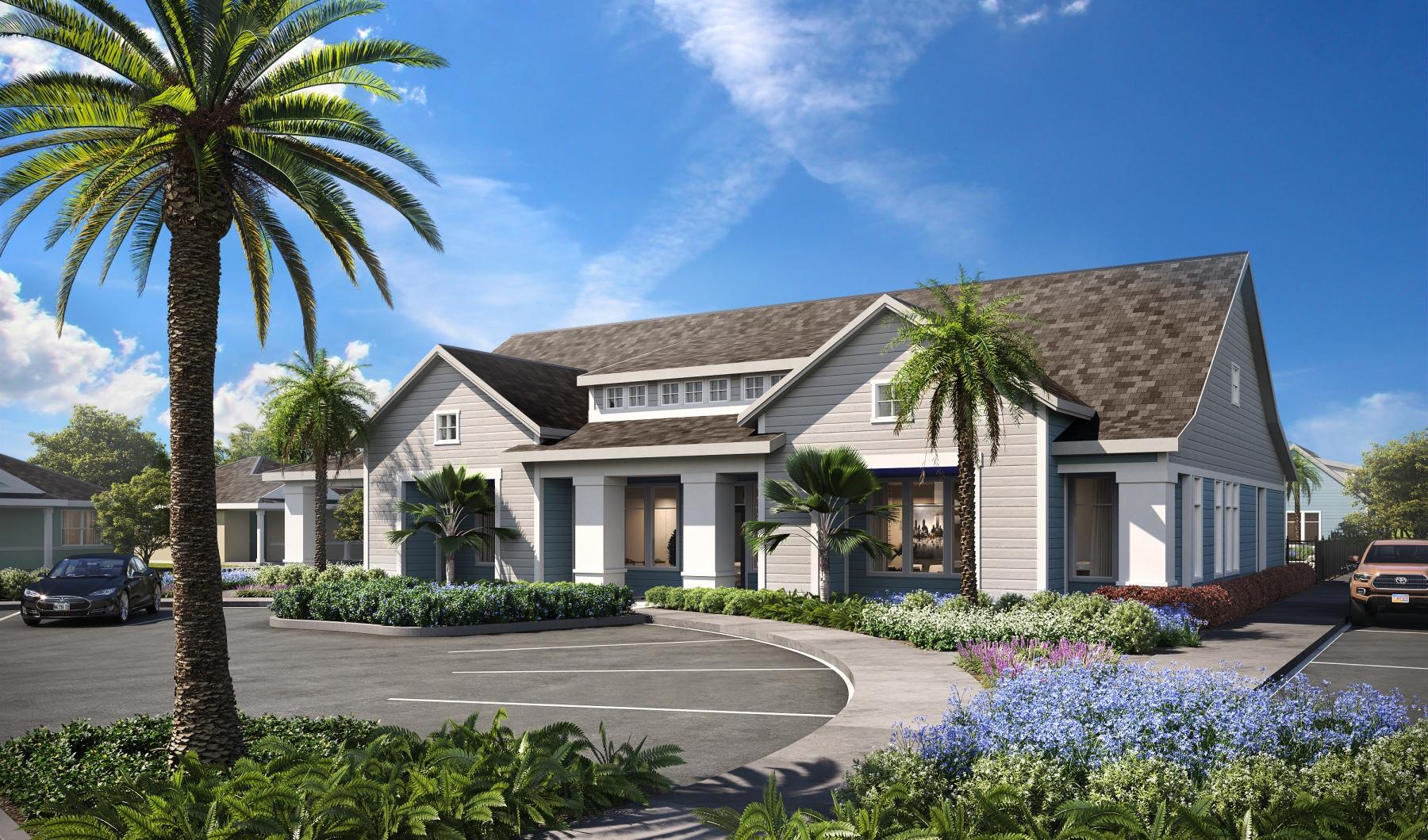 a large house with palm trees